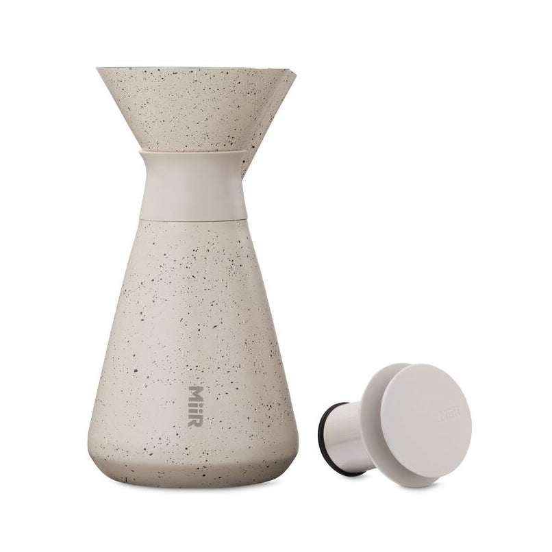 new-standard-carafe-t6 WebPDP-33oz_New_Standard_Carafe_Desert_Tan_Speckle_Studio__CAR1SVOS224_Front_Lid_Staged.jpg